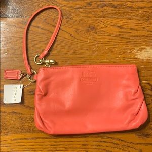 Coach wristlet in Papaya
